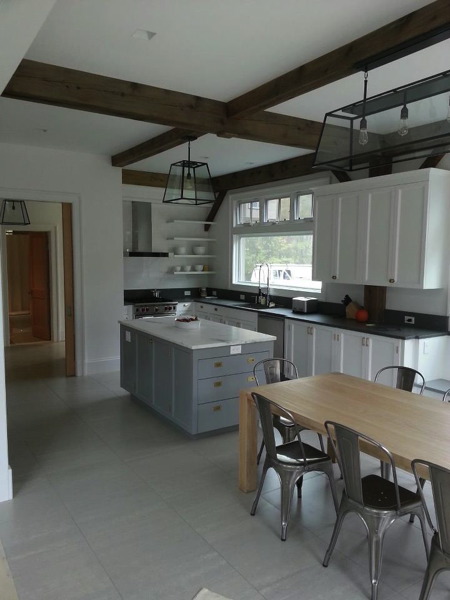 Interior, painted post and beam kitchen.
